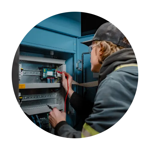CAE Service Technician working on a Boge air compressor